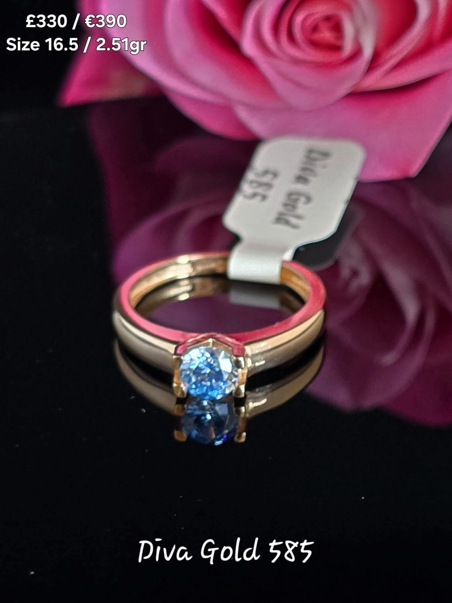Gold women ring / blue zircon stone. Size 16.5