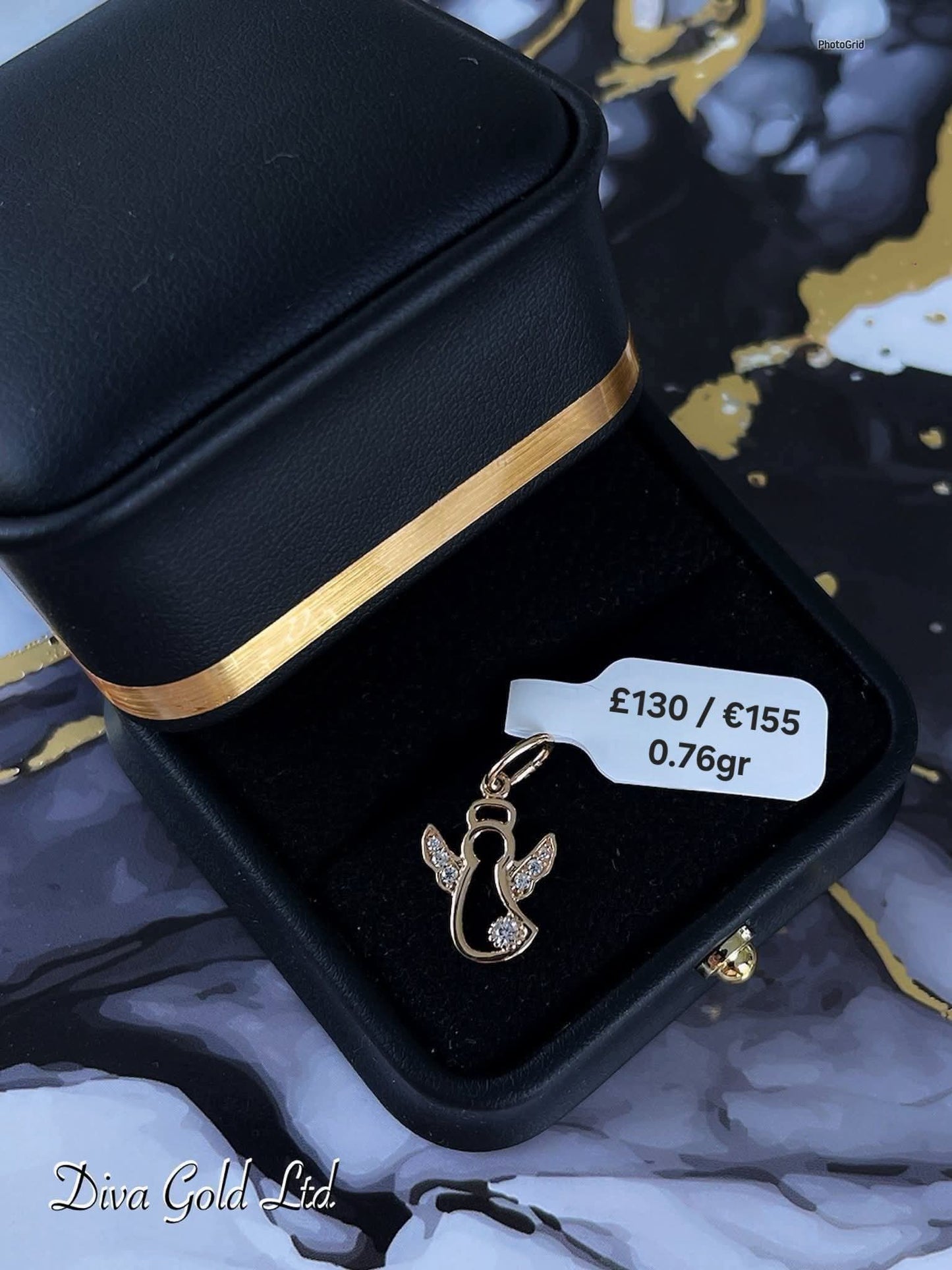585 Gold Angel pendant. 0.76gr
