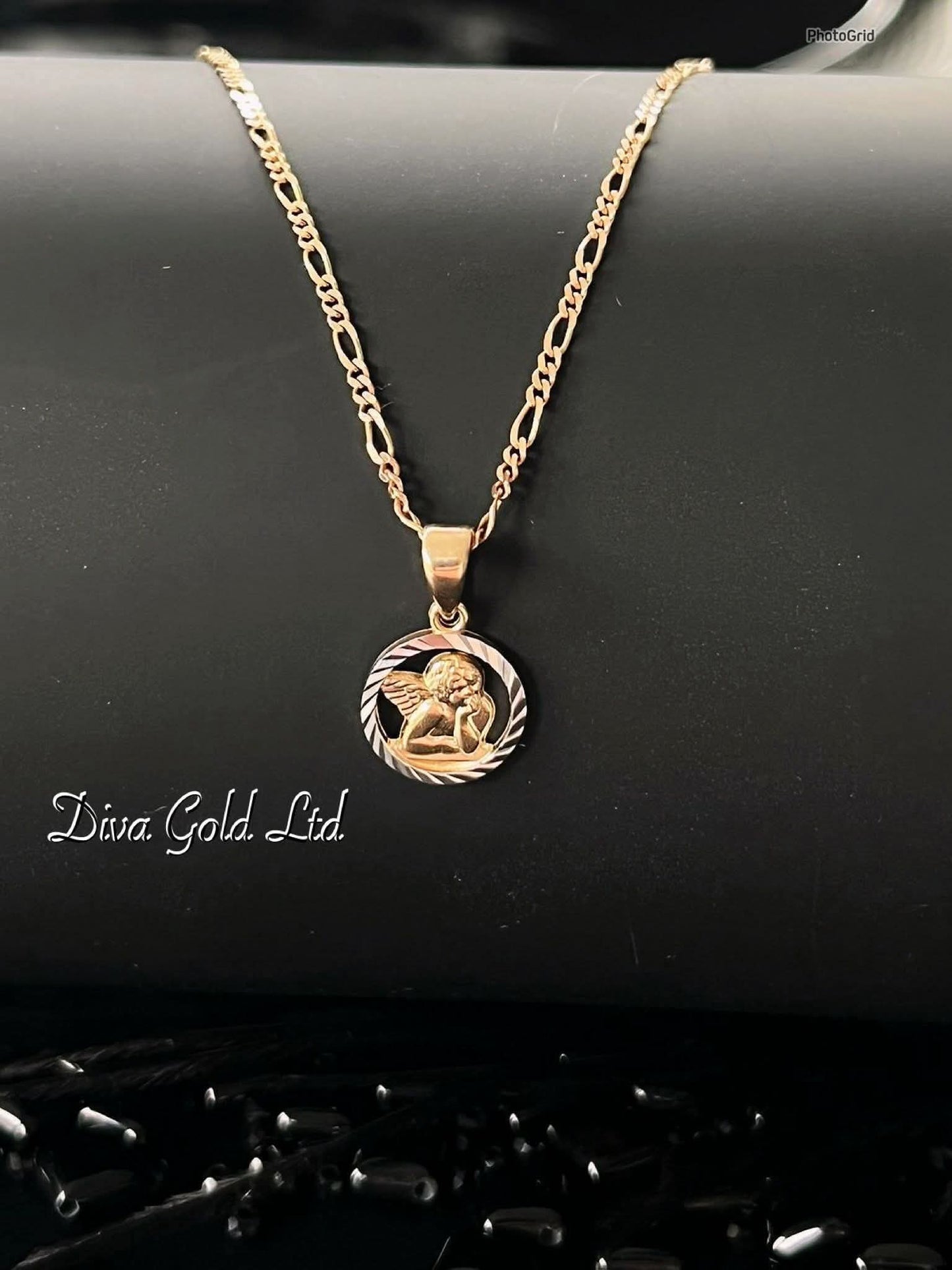 585 Gold angel pendant. 0.86gr