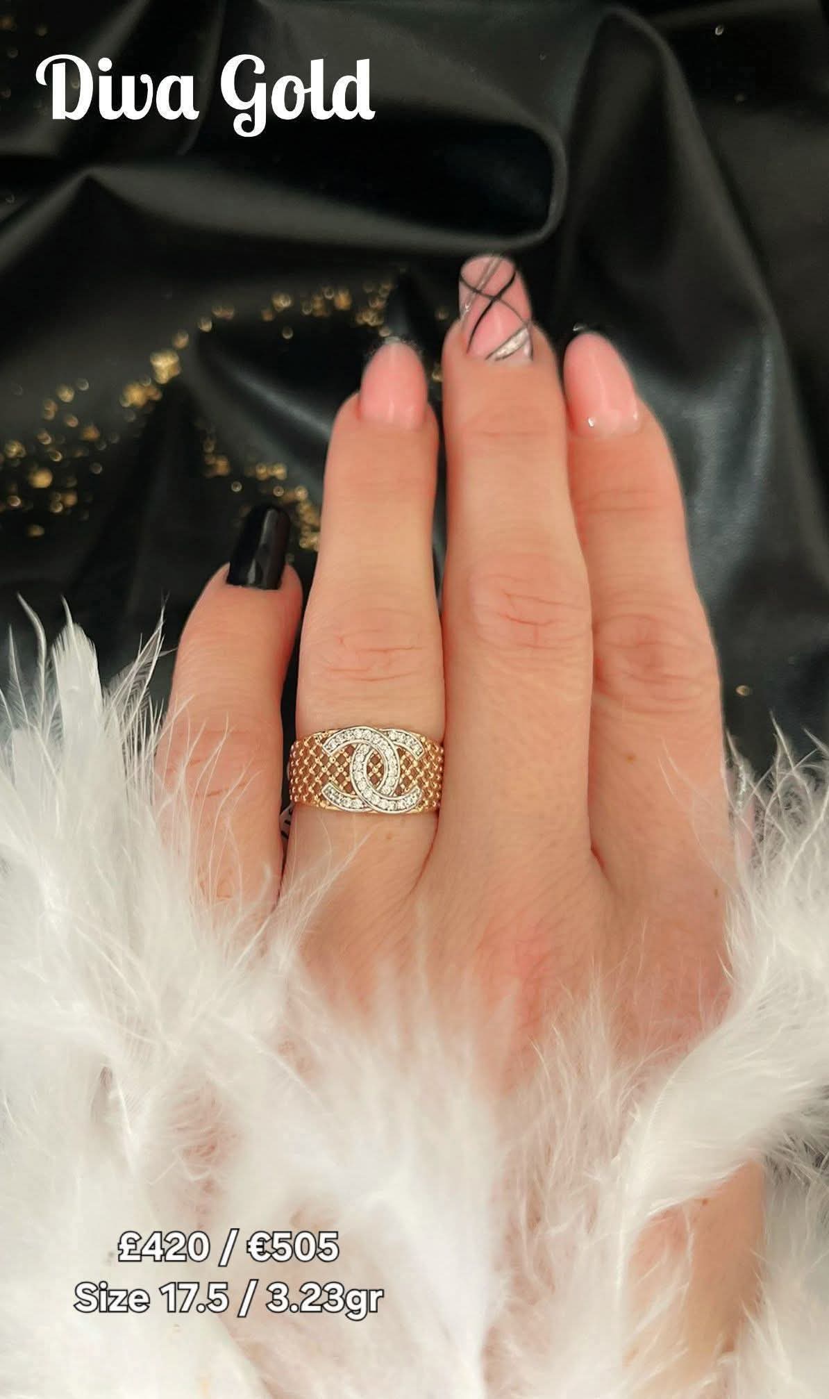 Gold women Chanel style ring.Size 17.5