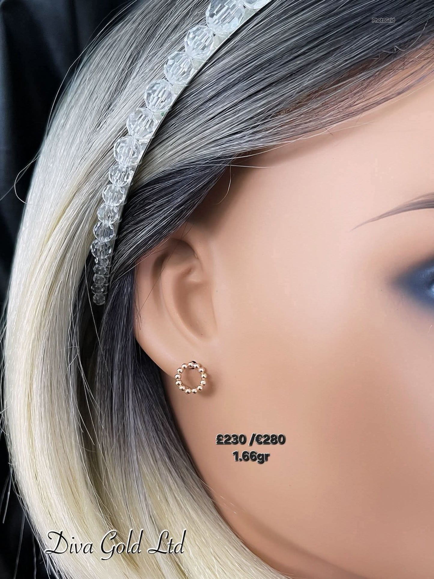 Stud gold earrings.