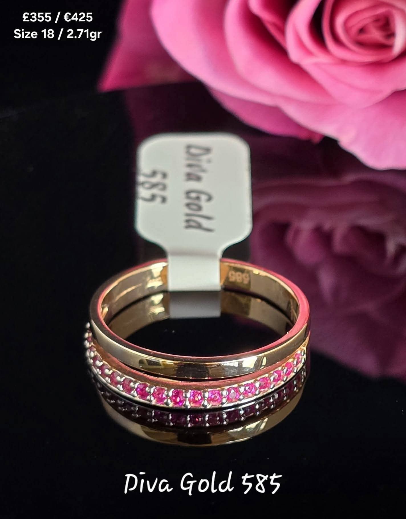 Gold women ring with pink zircon stones .Size 18