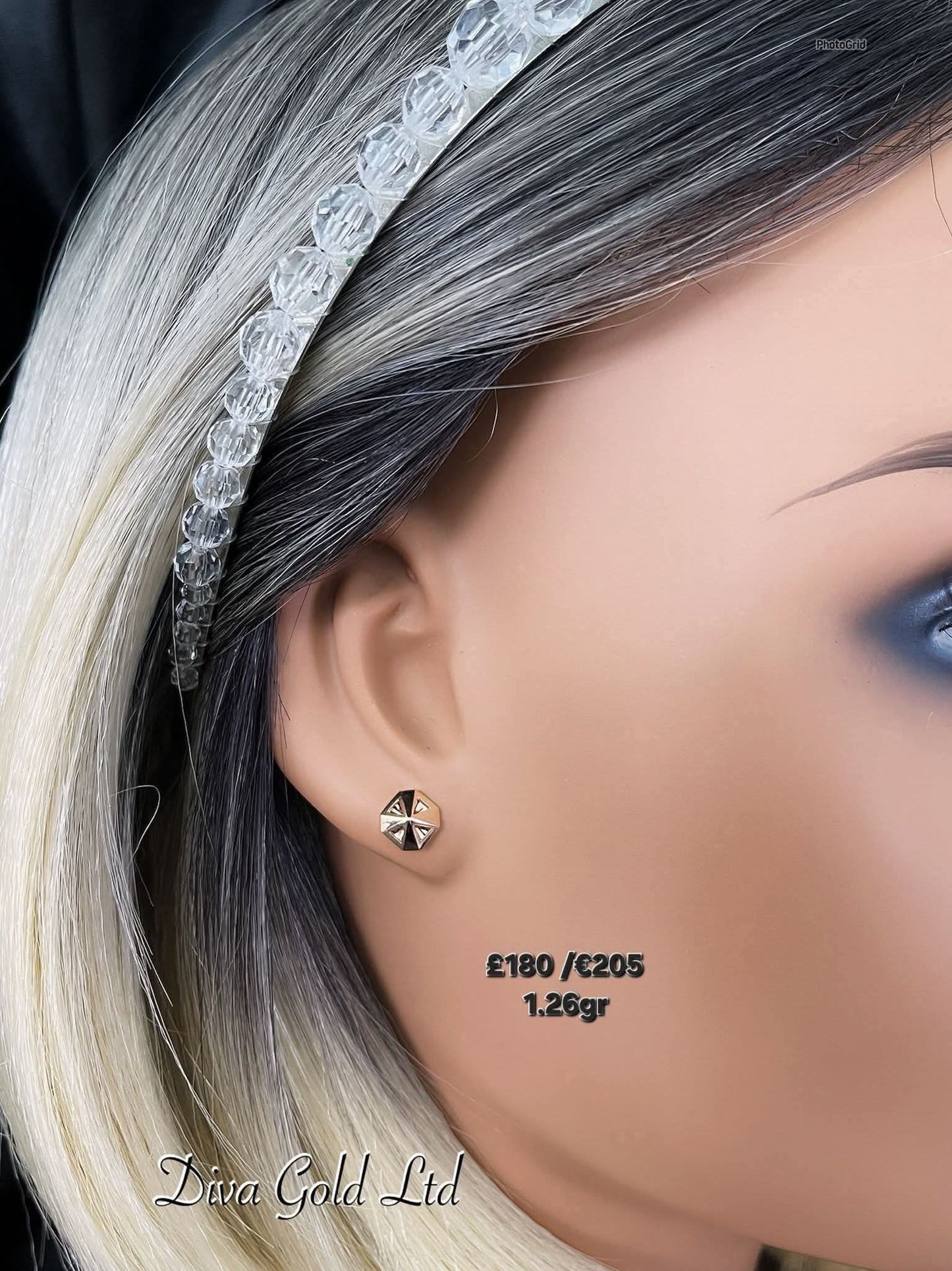 Stud gold earrings.