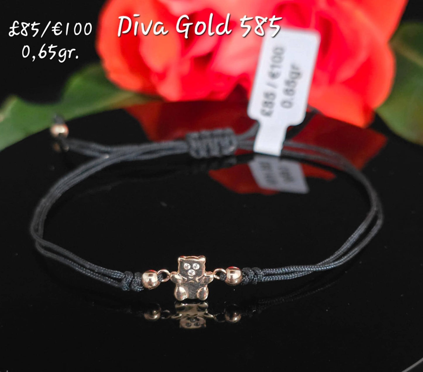 Black thread bracelets with 585 gold details.