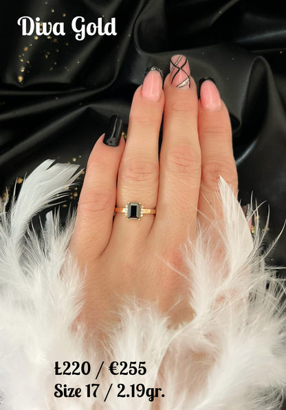 Gold ring with black zircon stones. Size 17