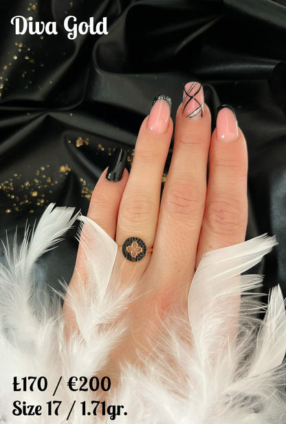 Gold ring with black zircon stones. Size 17