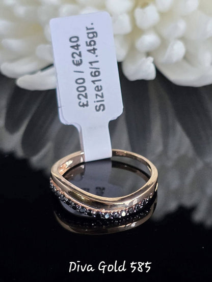 Gold women ring. Black zircon stones. Size 16