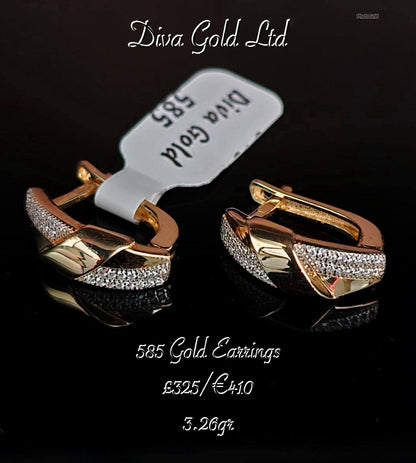 Gold 585 earrings with white zircon stones.