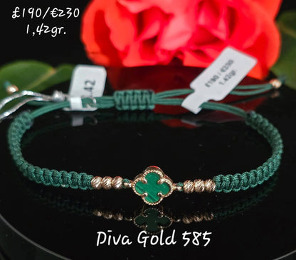 Green clover thread bracelet with 585 gold details.