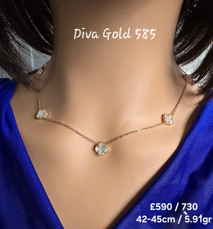 Gold chain with white clover pendants. 42-45 cm