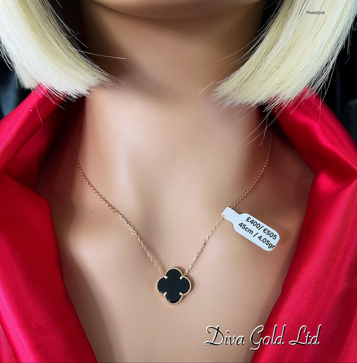 Gold chain with black clover. 45cm