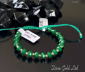 Green thread bracelet with 585 gold details. 0.68gram