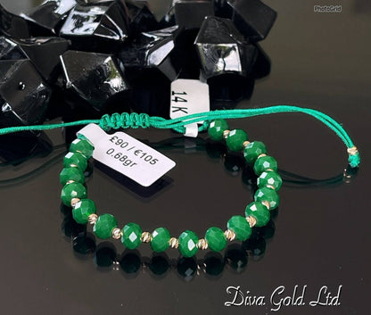 Green thread bracelet with 585 gold details. 0.68gram