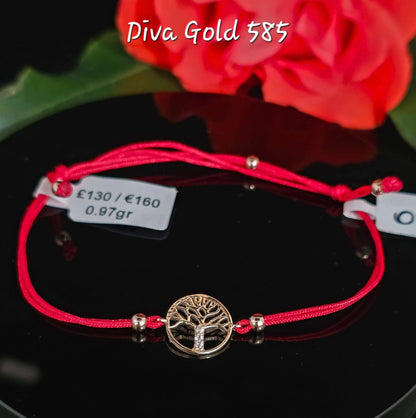 Red thread bracelets with 585 gold details.