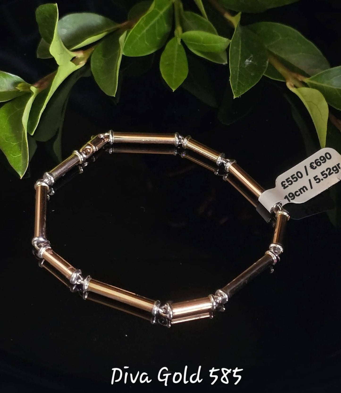 Gold bracelet with white gold details.  19cm