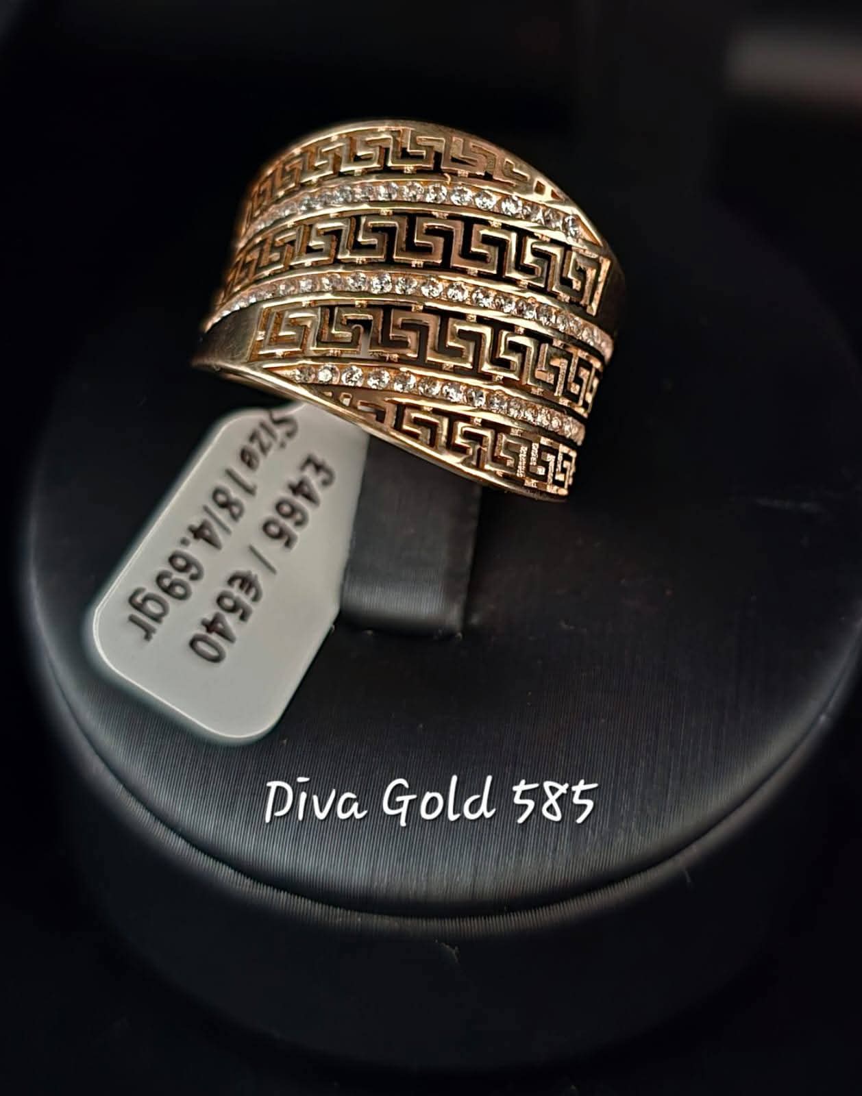 Gold ring with zircon stones. Size 18