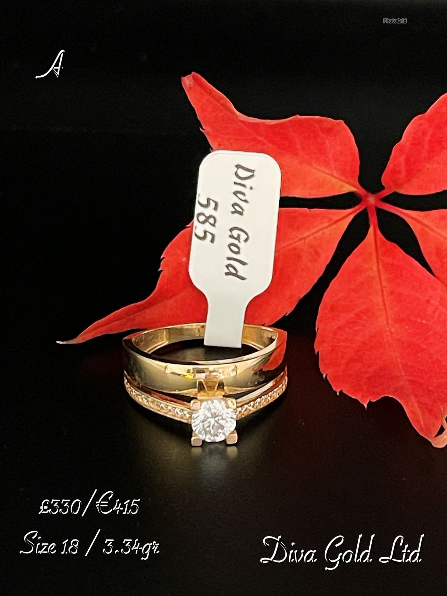 Gold Ring with zircon stones. Size 18