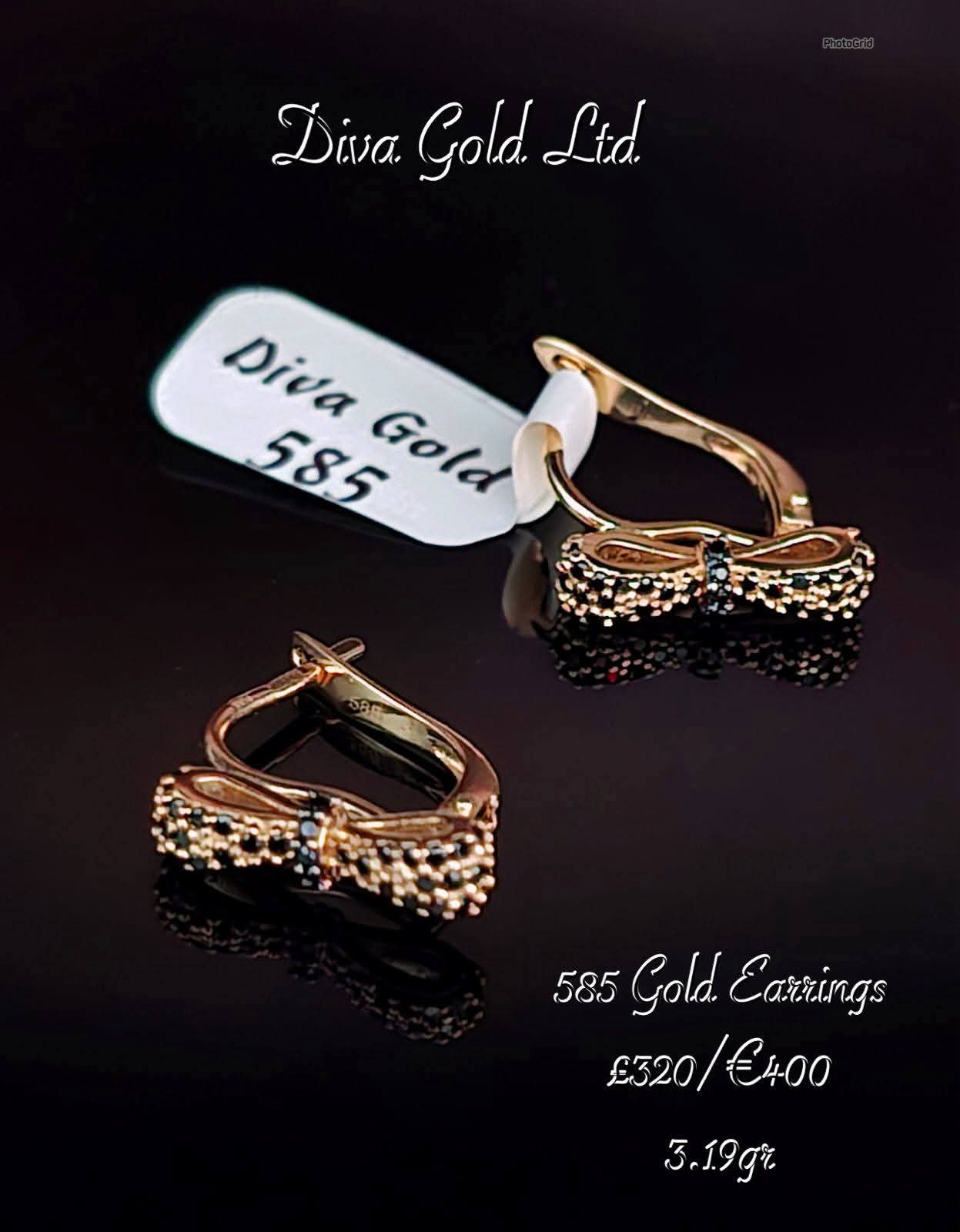 Gold 585 earrings with black rizcon stones.