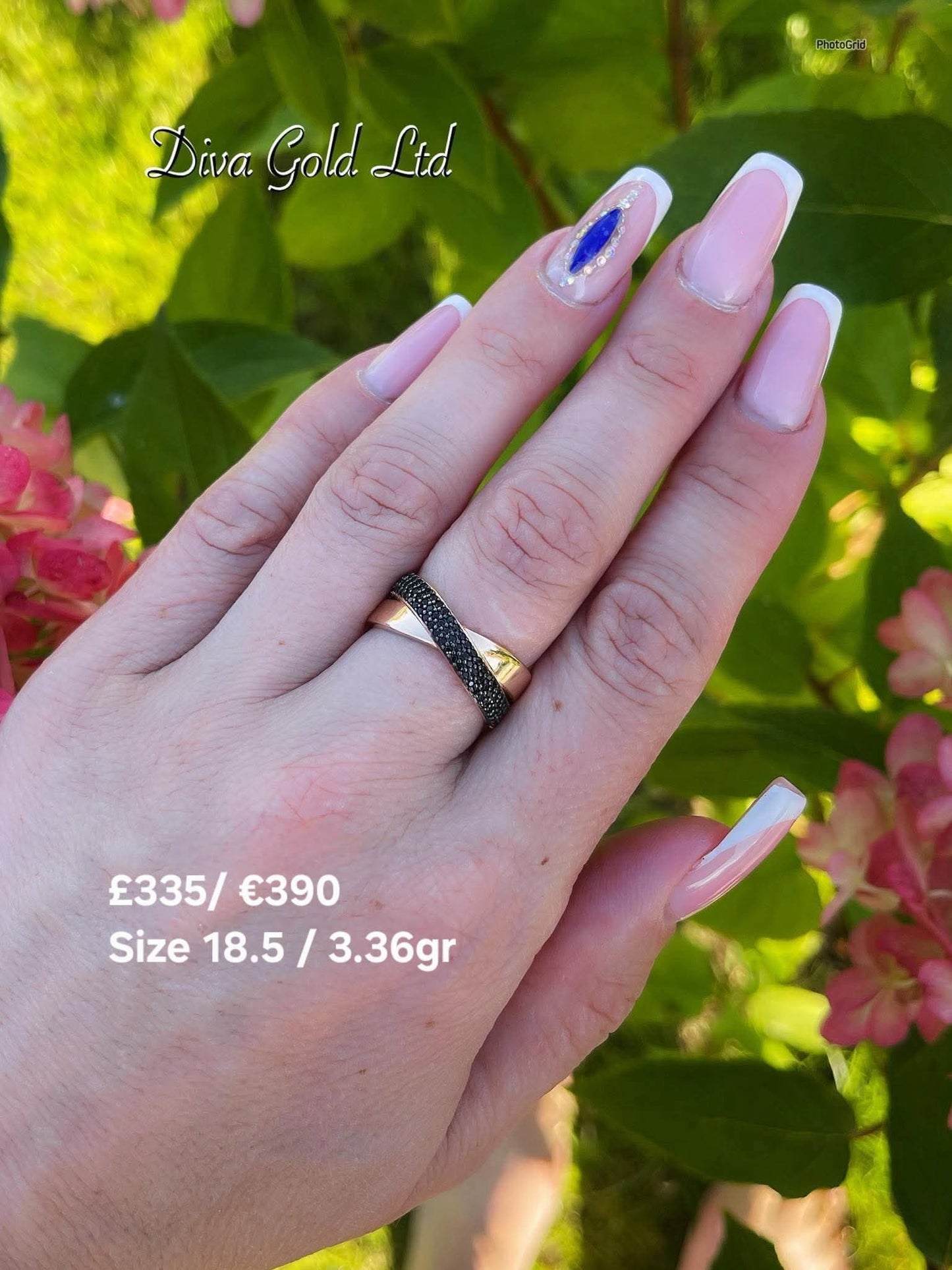 Gold ring with black zircon stones. Size 18.5