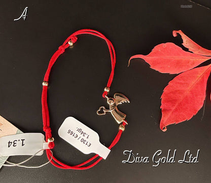 Red thread bracelet with gold details.