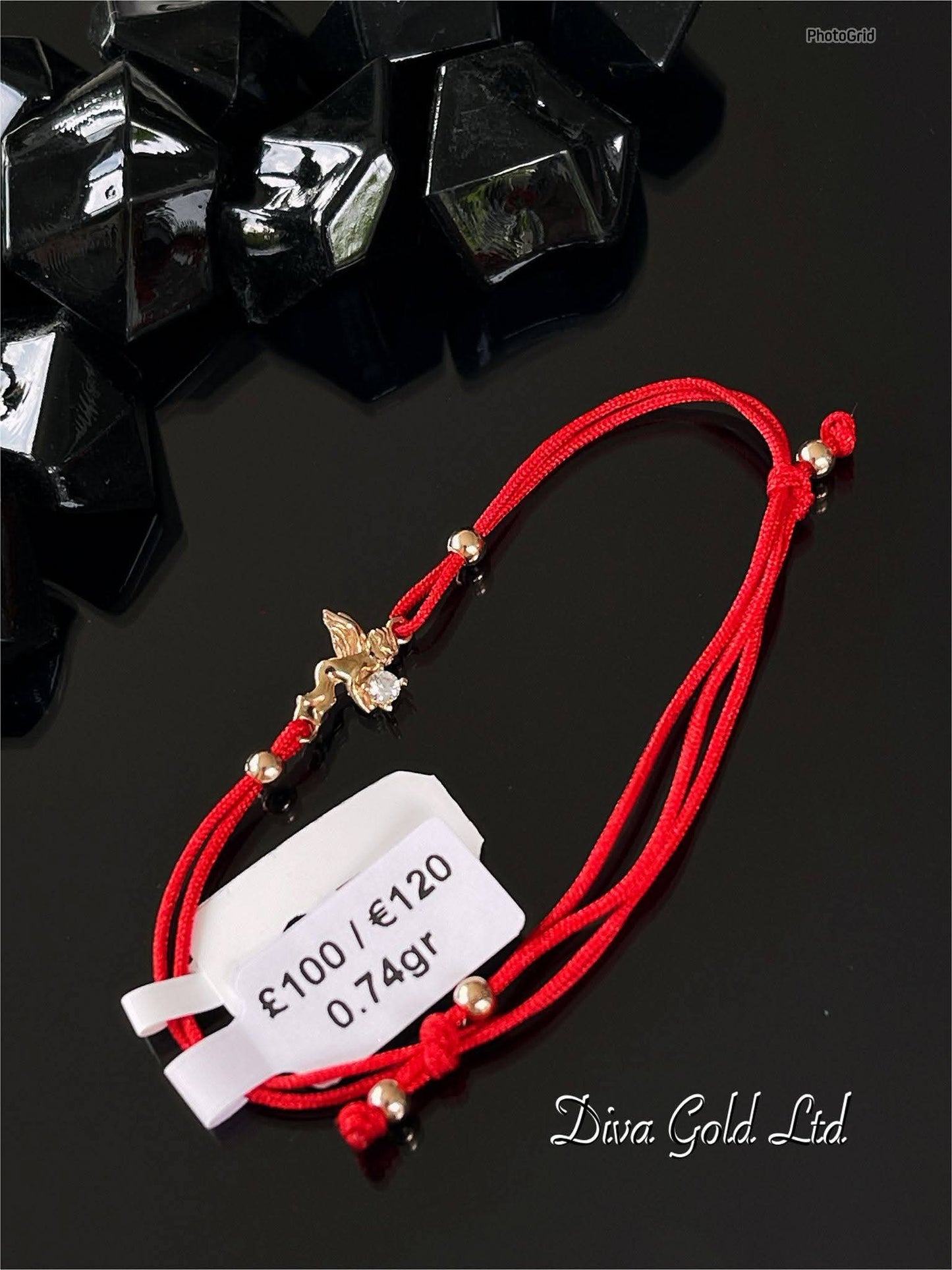 Red thread bracelet with 585 gold details. 0.74gram