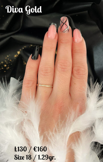 Gold ring with zircon stones. Size 18