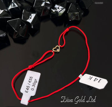 red thread bracelet with heart. 0.30 gram