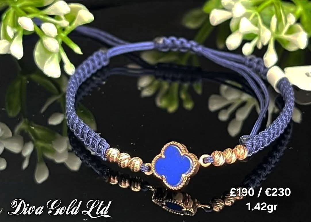 Blue clover thread bracelet with 585 gold details.