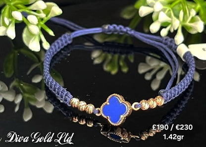 Blue clover thread bracelet with 585 gold details.