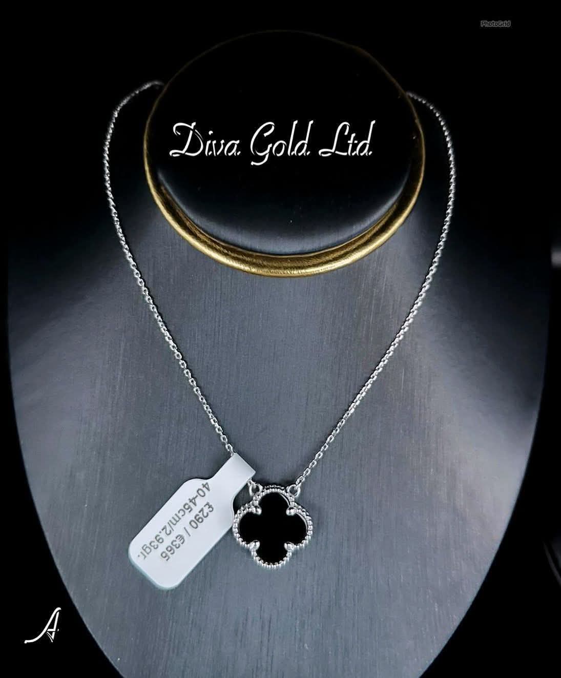White Gold chain with black clover pendant. 40-45cm