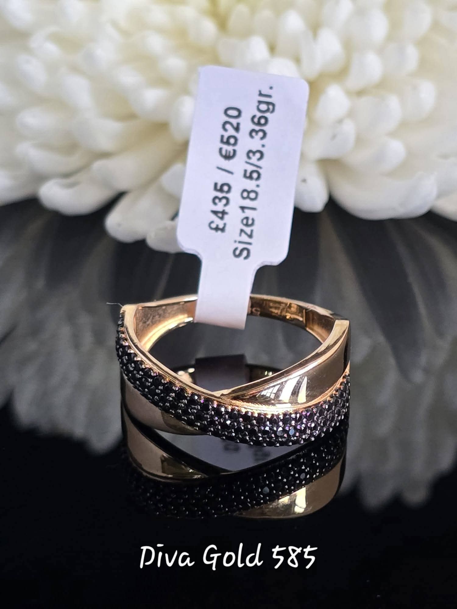 Gold women ring with black zircon stones. Size 18.5
