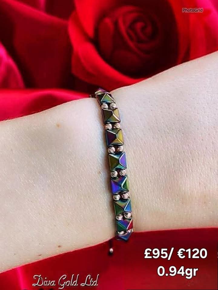 Colored thread bracelet with gold details.