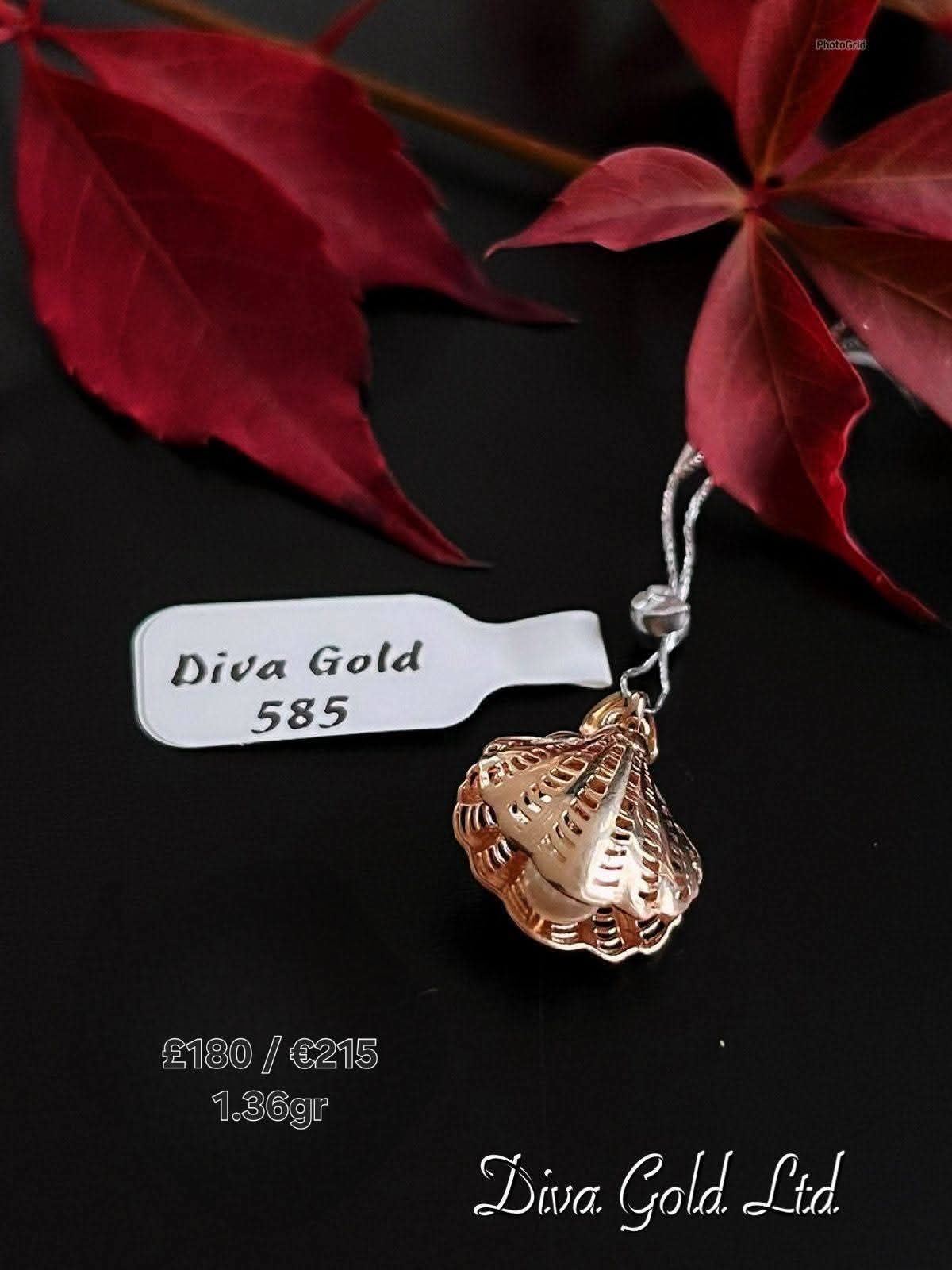 585 Gold pendant with pearl. 1.36gr