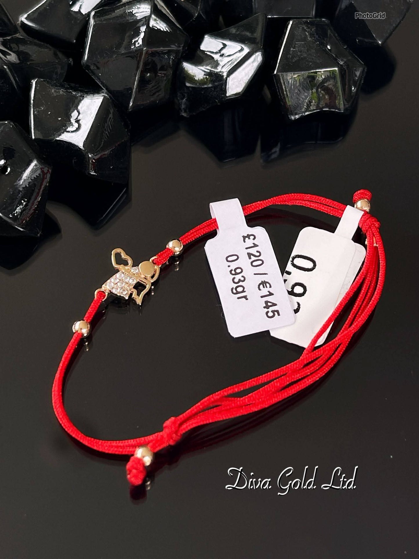 Red thread bracelet with 585 gold details. 0.93gram