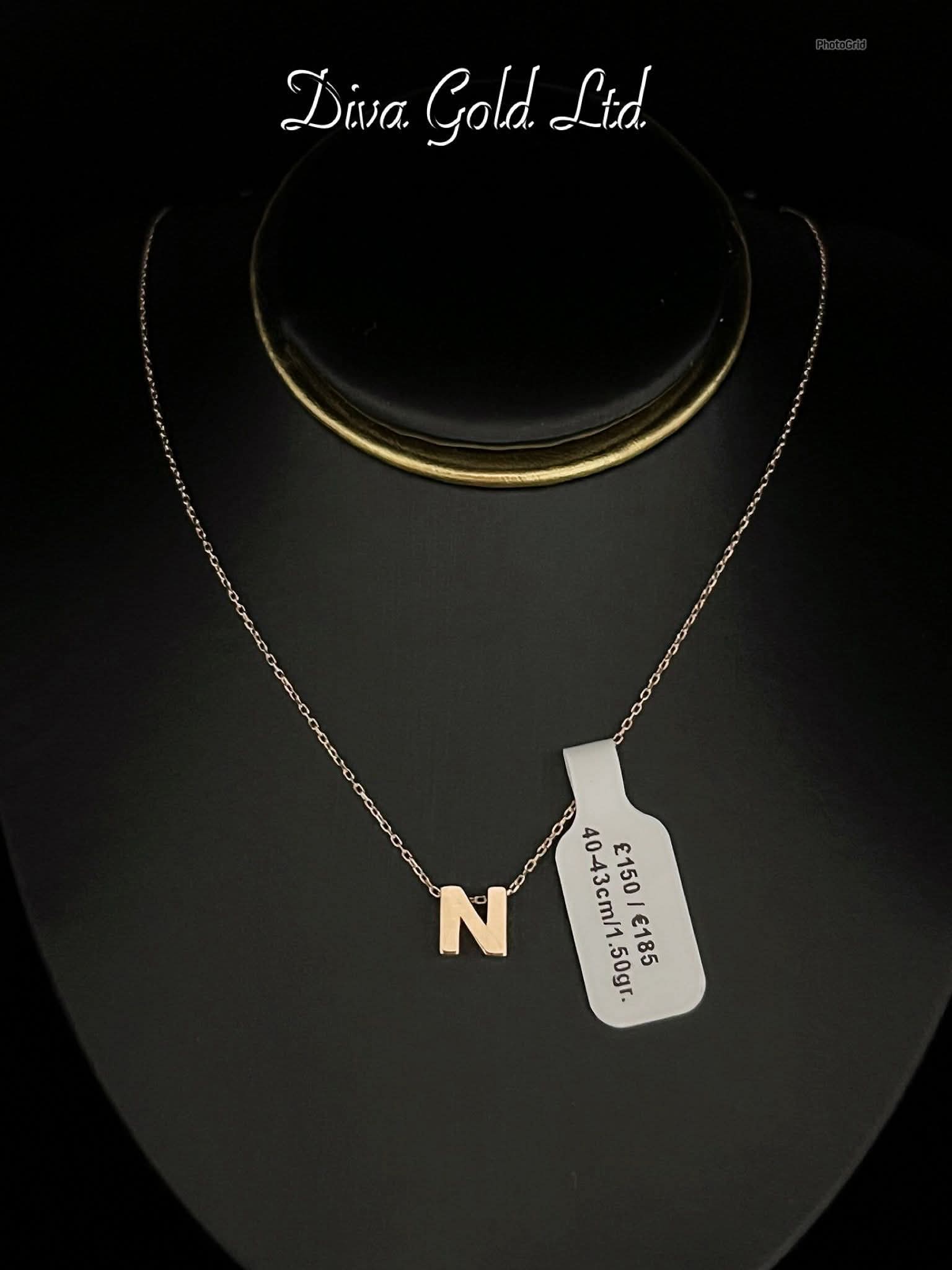 Gold chain with letter N pendant. 40-43cm