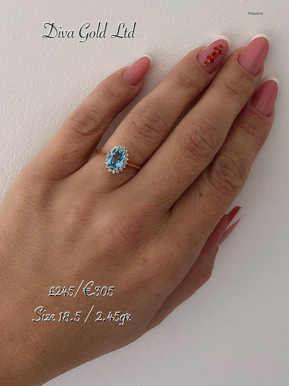 Gold ring with blue&white zircon stones. Size 18.5