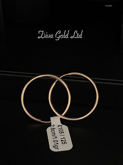Gold 585 hoop earrings.