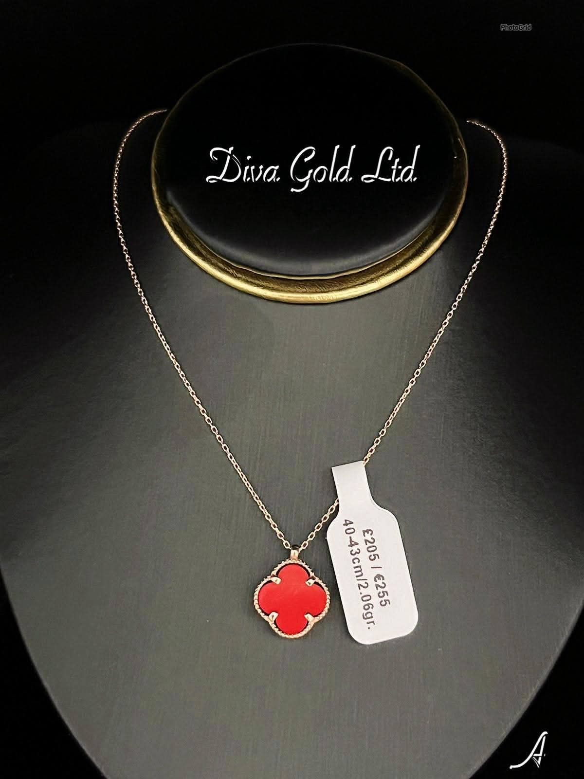 Gold chain with red clover pendant. 40-43cm