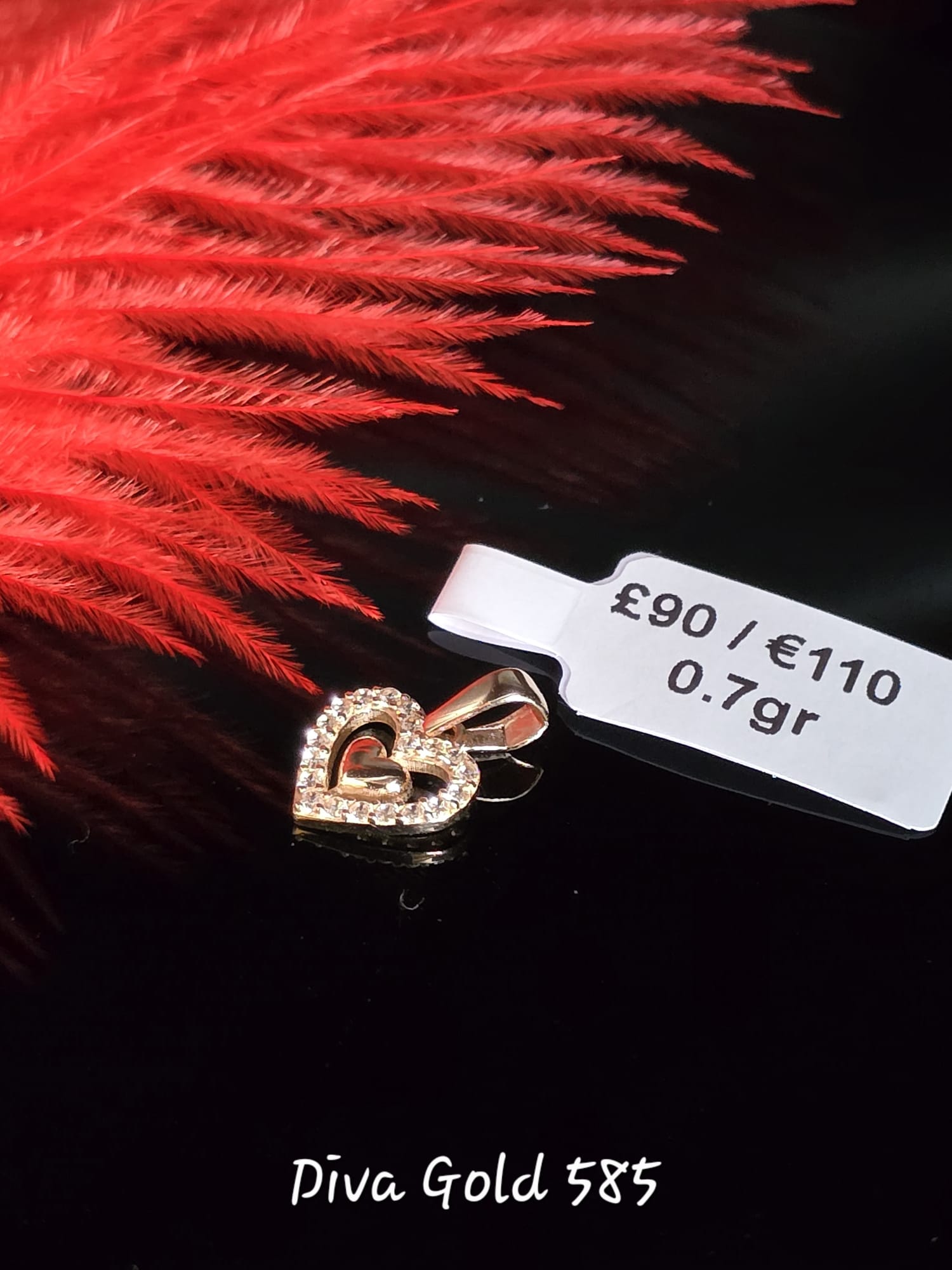 585 Gold pendant 0.70gr