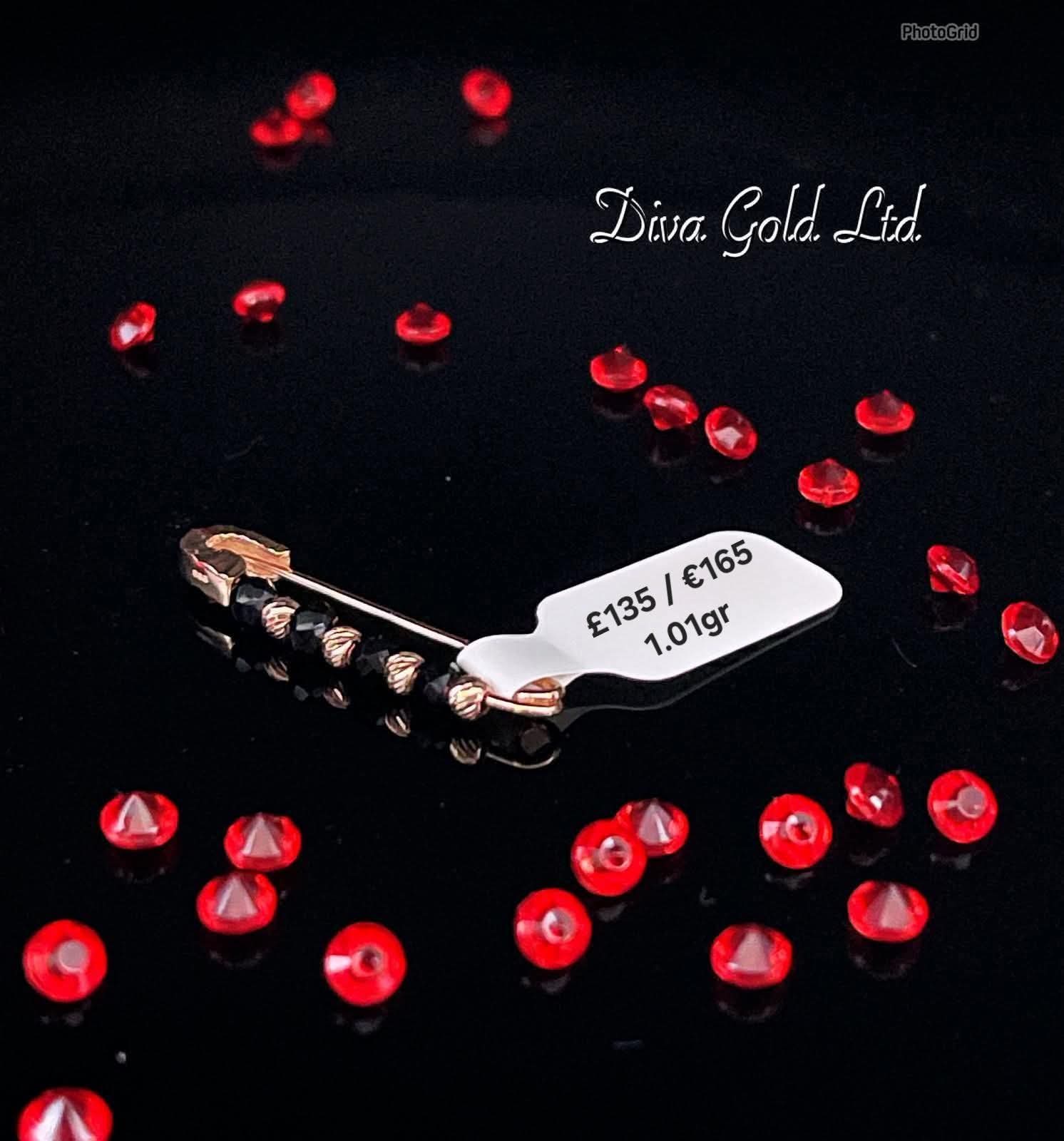 gold brooch with onyx. 1.01 gram