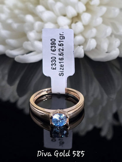 Gold women ring / blue zircon stone. Size 16.5