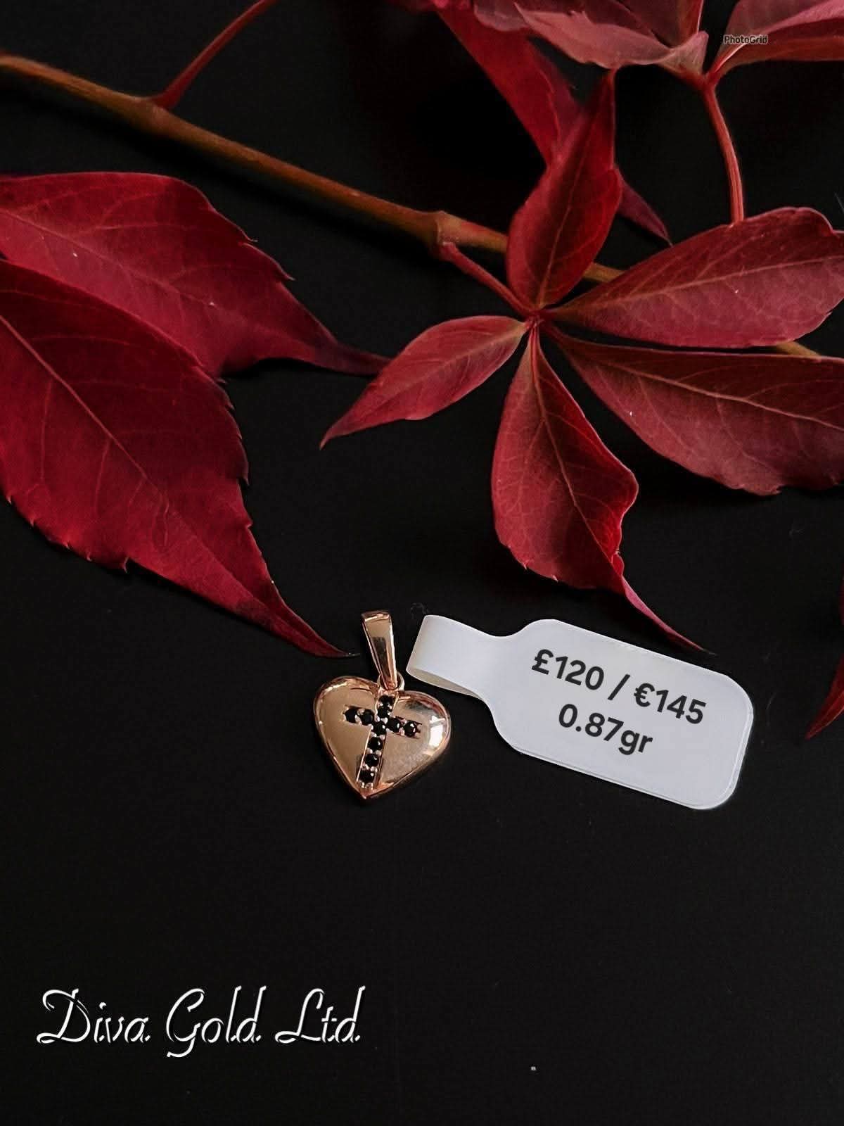 585 Gold heart with cross pendant. 0.87gr
