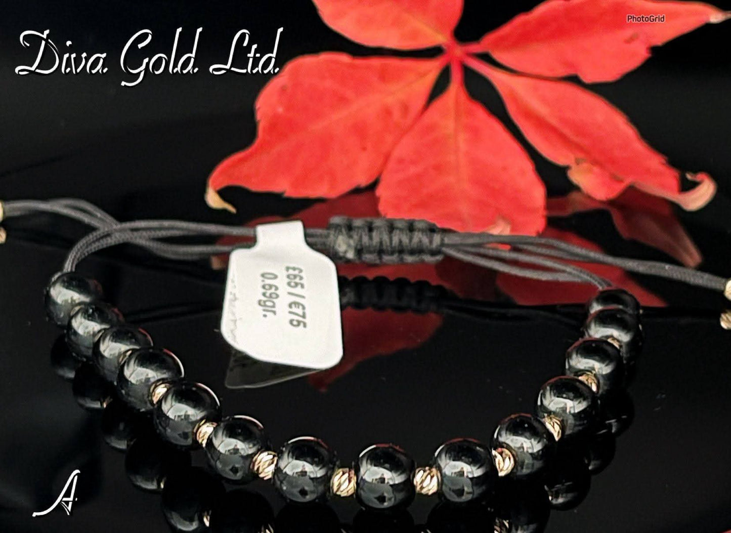 Black thread bracelet with gold details.