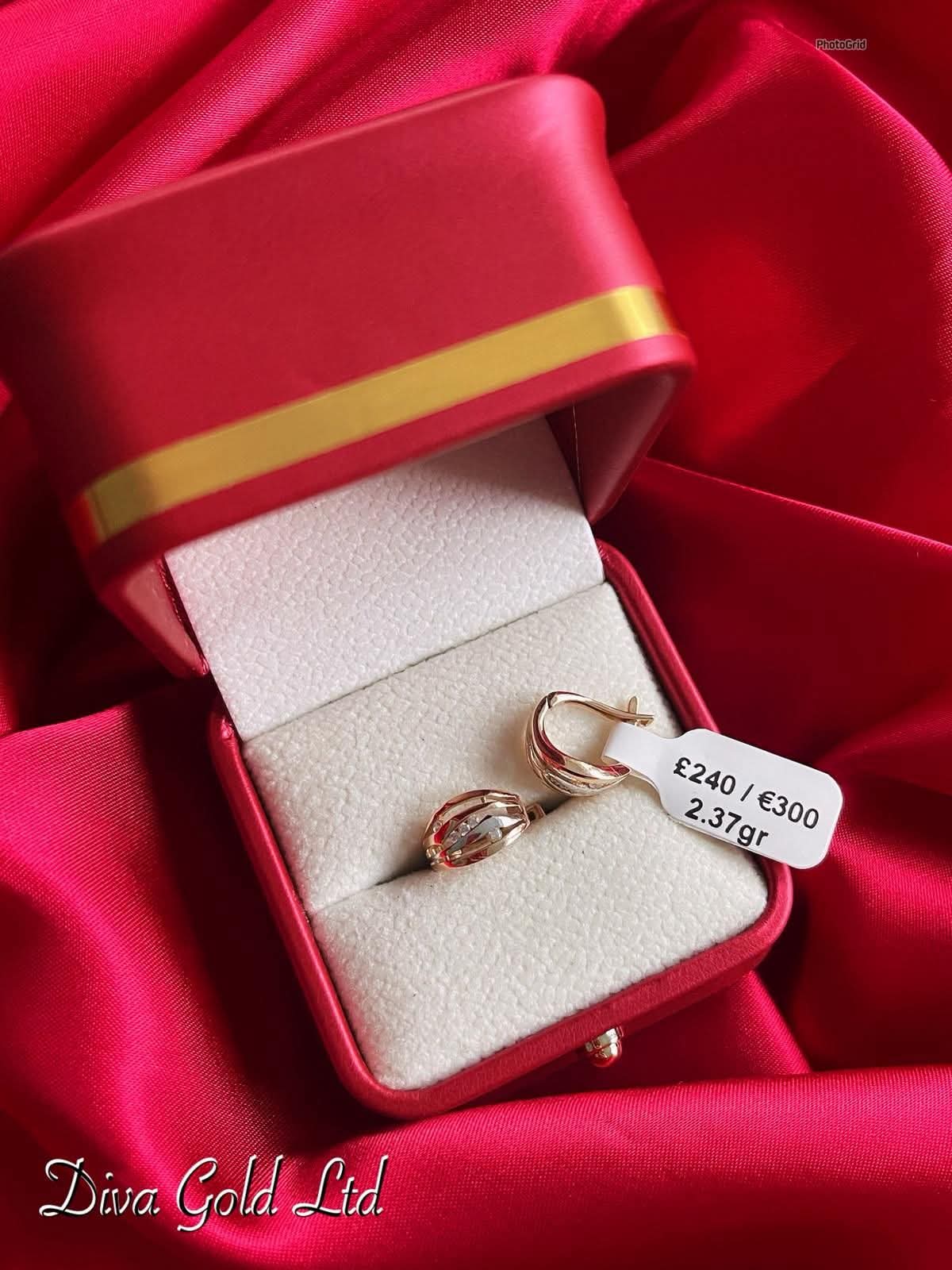 Gold 585 earrings with white zircon stones