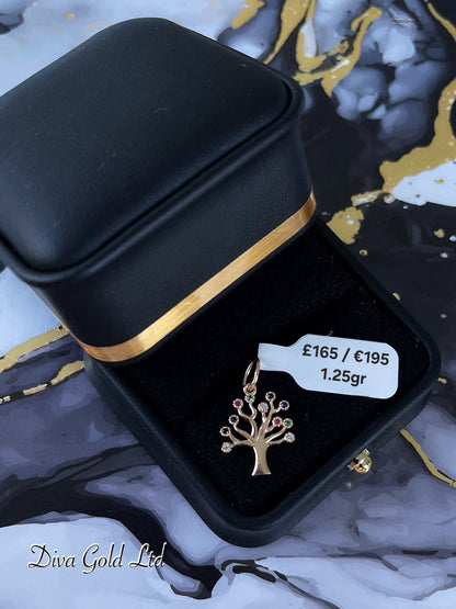 585 Gold family tree pendant. 1.25gr