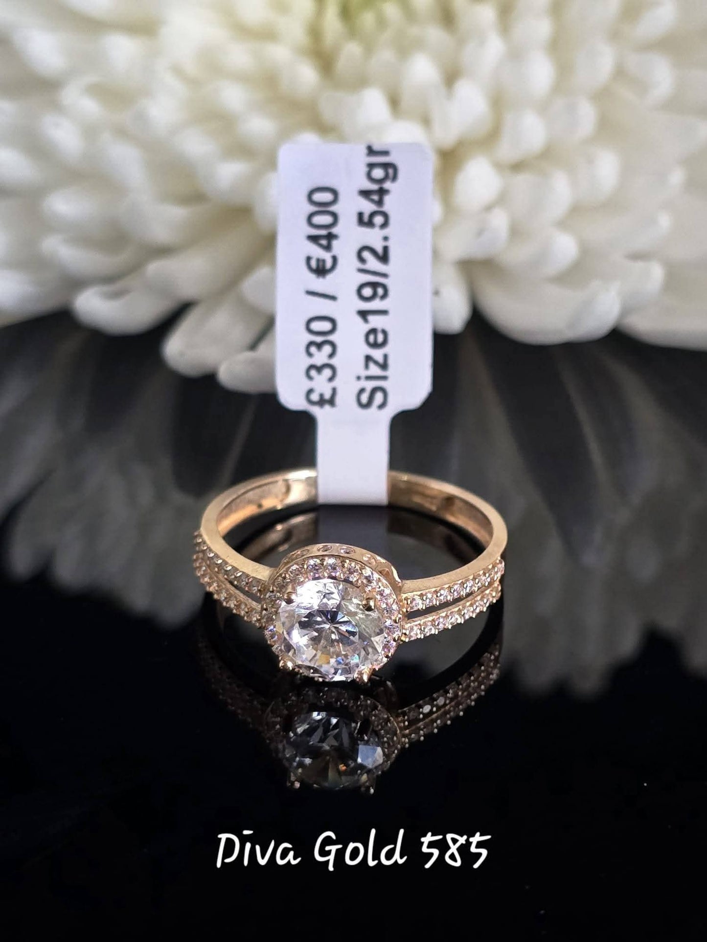 Gold women Ring with white zircon stones. Size 19