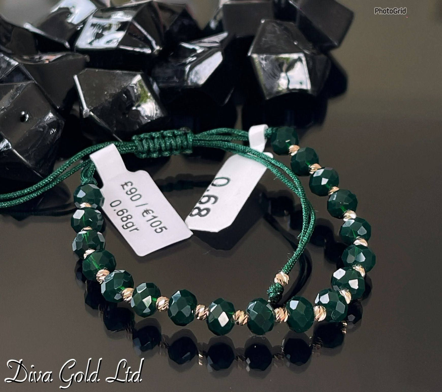 Dark green thread bracelet with 585 gold details. 0.68gram