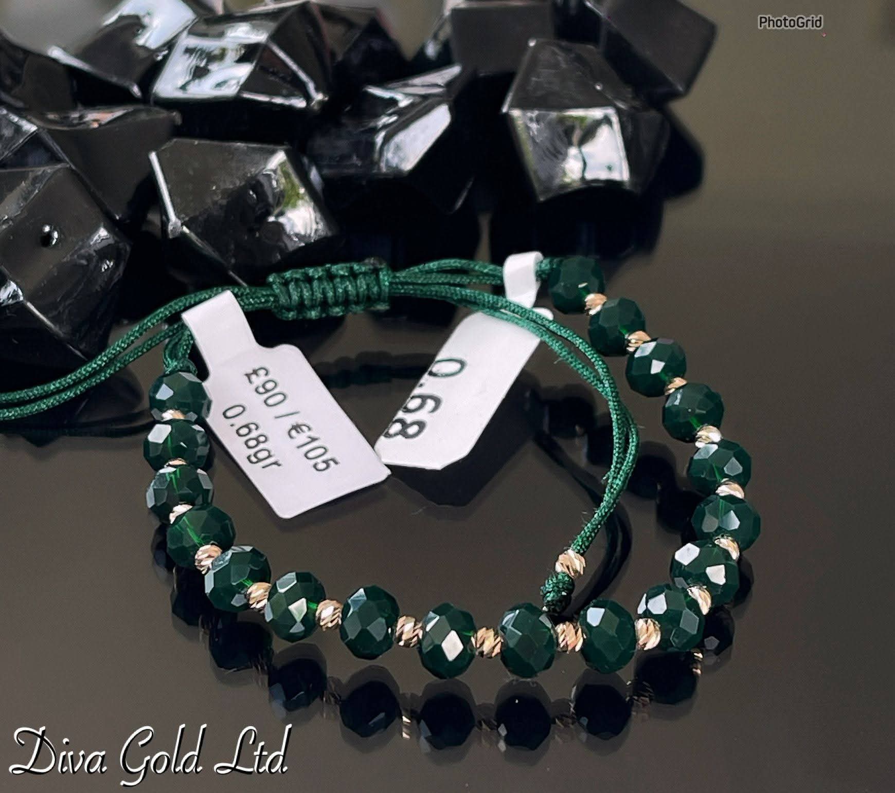 Dark green thread bracelet with 585 gold details. 0.68gram