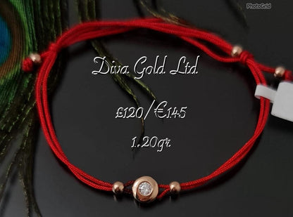 Red thread bracelet with gold details & zircon stone