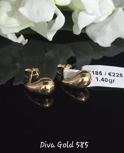 Stud drop gold earrings.